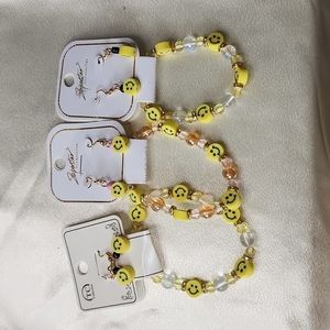 Smiley face bracelet and earring set